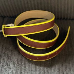 brown and neon yellow size medium belt